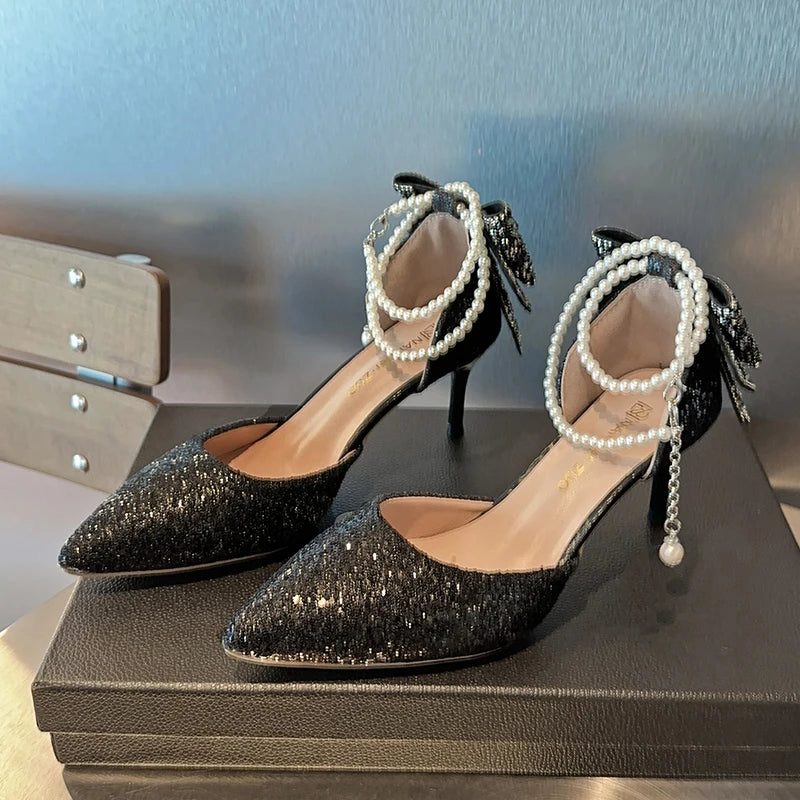 Elegant French new pointy high heels by Mohammad Collection with sequin bows, pearl accents, and a shallow mouth design.