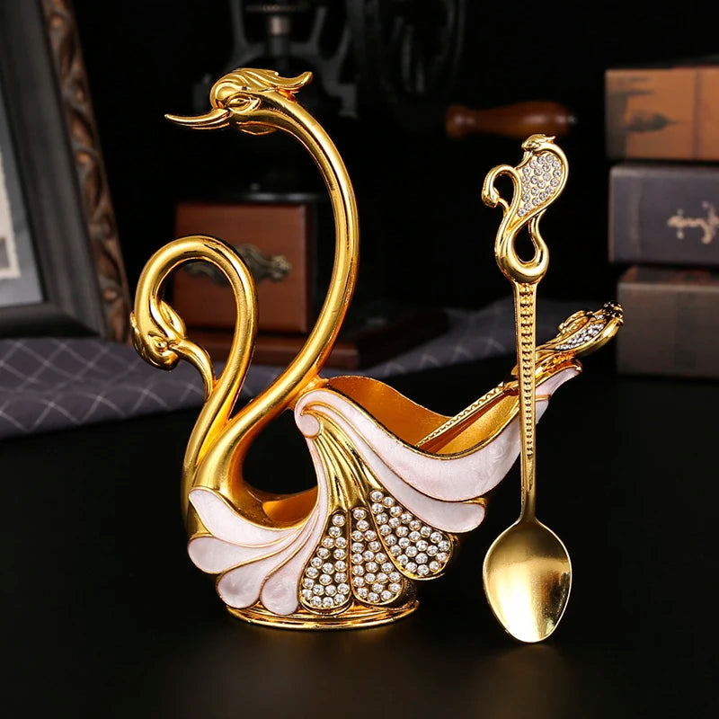 Swan-shaped fruit fork and spoon set by ๐๐ ๐๐๐ ๐น๐๐๐๐ ๐ป๐๐๐๐ ๏ฟฝ