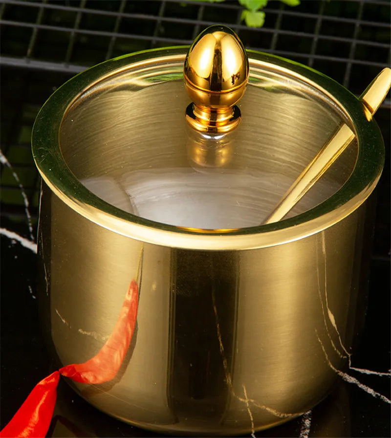 Gold MC THE BLACK DIAMOND 304 seasoning box with glass cap, spoon, and spice jar for storing sauces, salt, and flavorings.