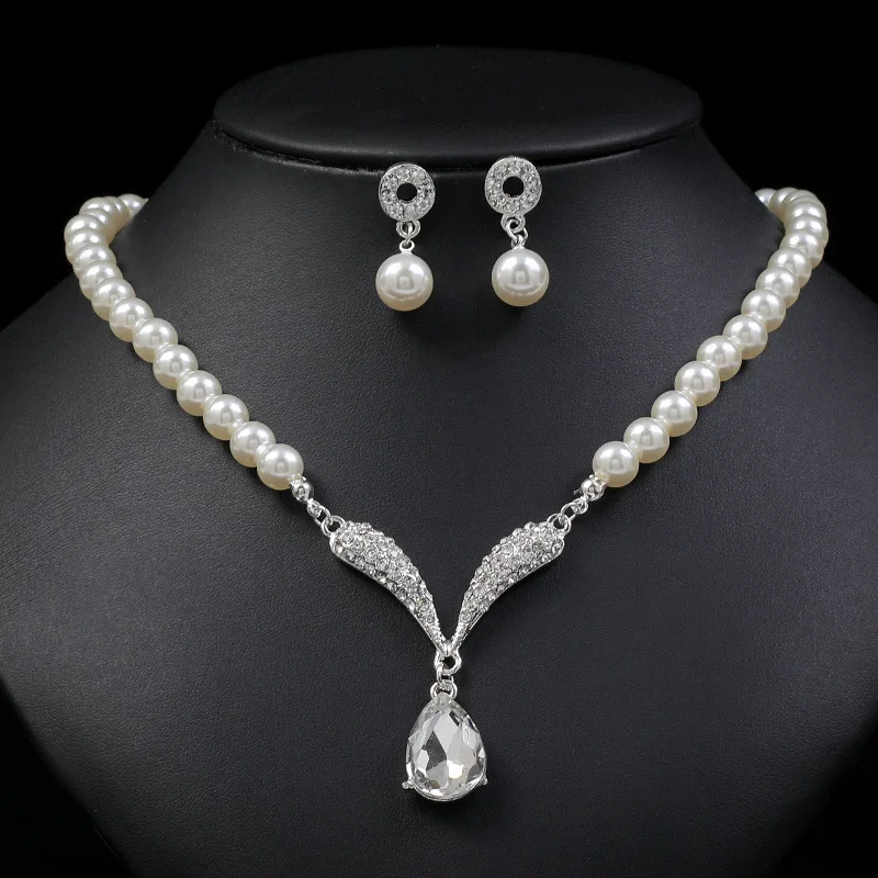 Mohammad Collection women's 3-piece pearl jewelry set with gold necklace and earrings, versatile for elegant styling.