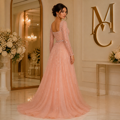 Elegant pink Dubai evening dress by MC THE BLACK DIAMOND featuring a flowing design and intricate details for formal events.