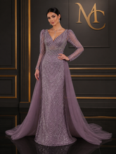 Elegant black MC THE BLACK DIAMOND long sleeve evening dress for women, featuring a fitted silhouette and stylish design.