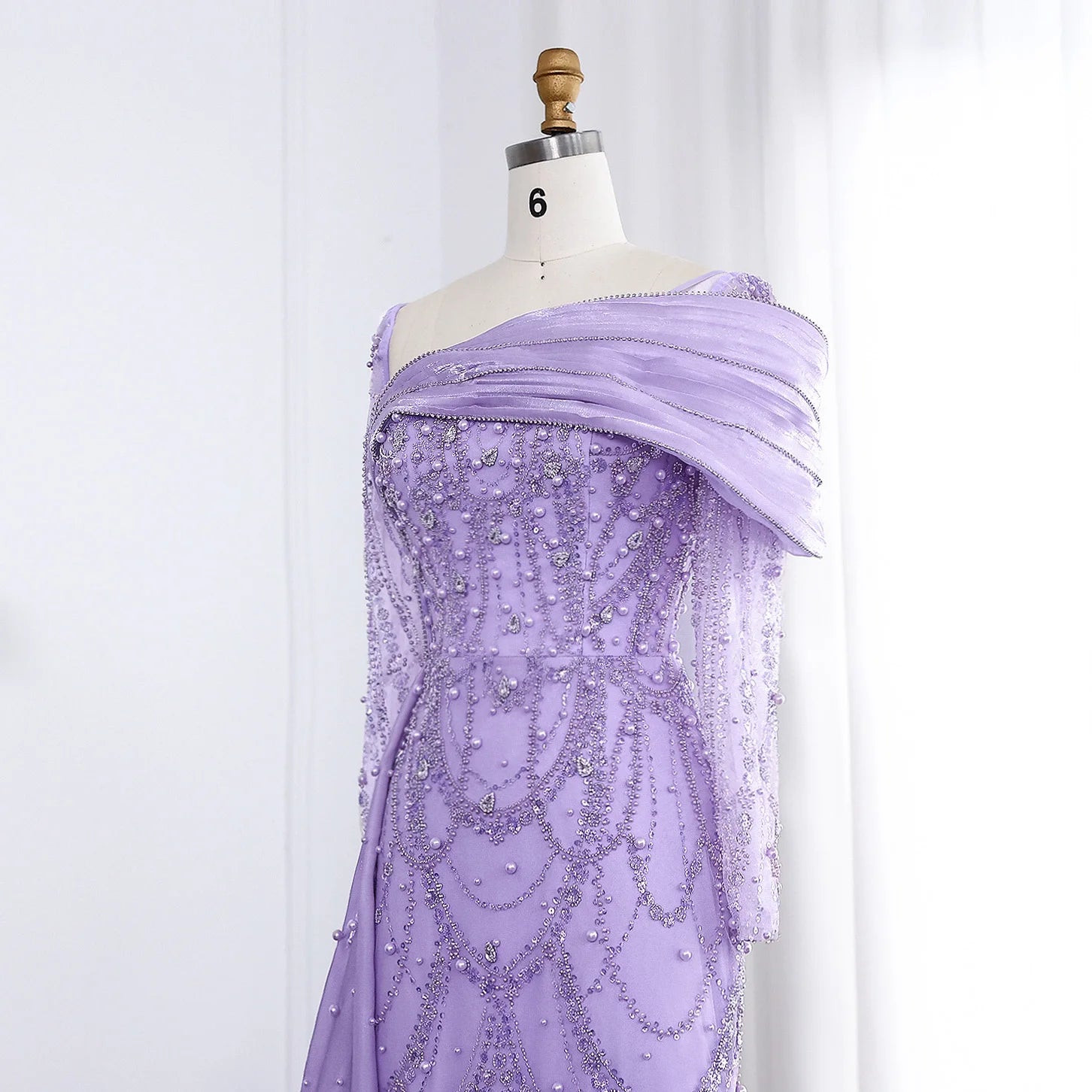 Elegant one-shoulder evening dress by MC THE BLACK DIAMOND, featuring a sleek silhouette and sophisticated design.