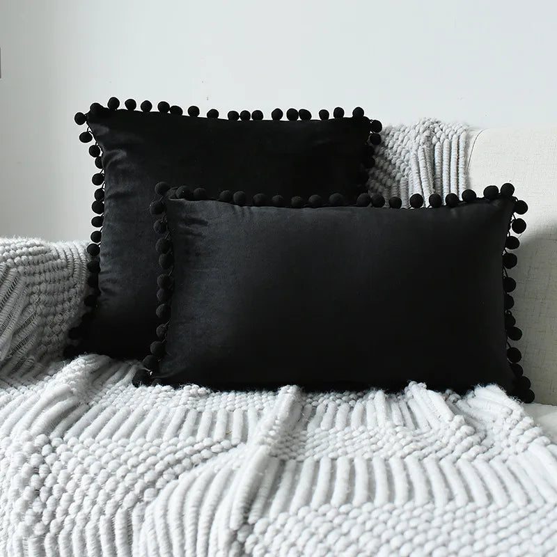 Soft velvet throw pillow cover by MC THE BLACK DIAMOND, large decorative sofa cushion case with pom-pom trim.