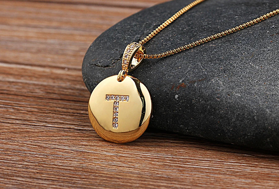 Initial letter necklace for women featuring copper charm with CZ stones, from Mc The Black Diamonds jewelry collection.
