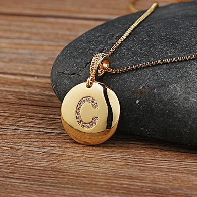 Nidin initial letter necklace for women and girls with copper charm and CZ accents, featuring letter A-Z from Mc The Black Diamonds jewelry line.