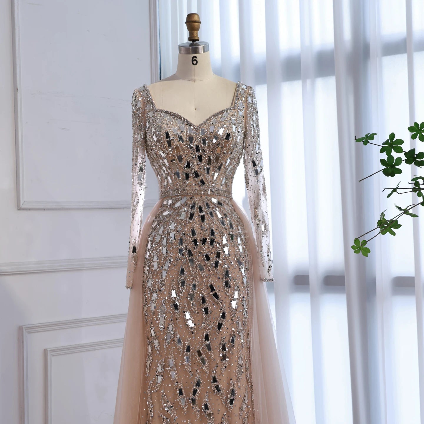 MC Luxury Arabic nude long sleeve mermaid evening dress by MC THE BLACK DIAMOND featuring fitted silhouette and elegant design.
