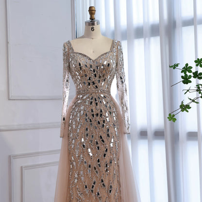 MC Luxury Arabic nude long sleeve mermaid evening dress by MC THE BLACK DIAMOND featuring fitted silhouette and elegant design.