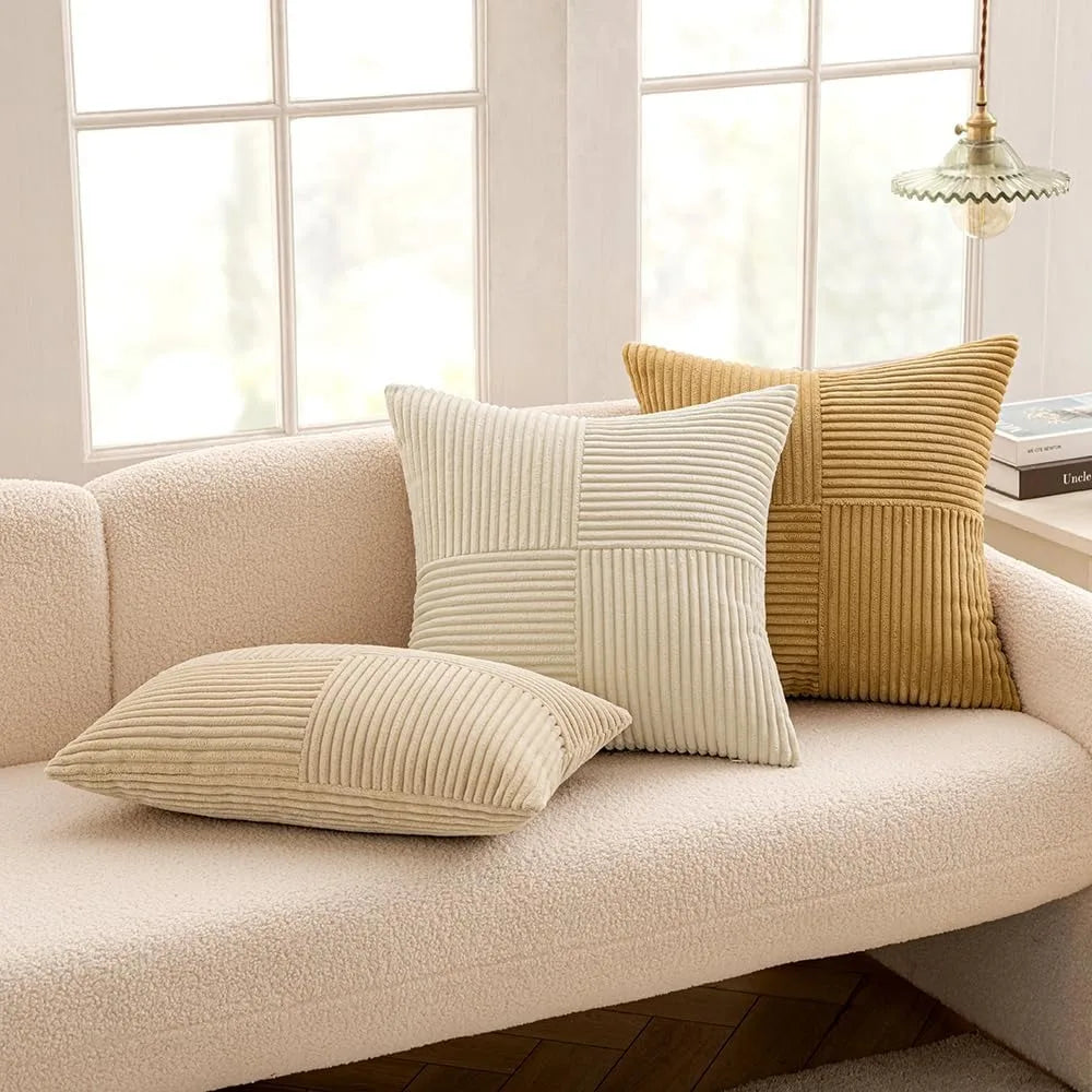 Mustard yellow corduroy pillow cover with boho spliced patchwork design, soft textured cushion case for cozy couches.