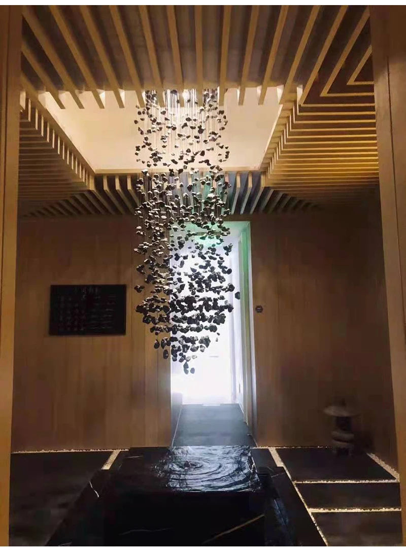 Black Art Luxury Stone Crystal Chandelier by MC The Black Diamond hanging in a hallway with LED lights and modern crystal design.