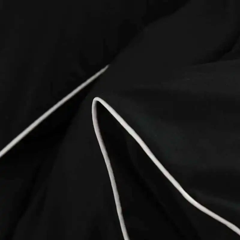 Black bedding set with minimalist quilt design from 𝕄𝕔 𝕋𝕙𝕖 𝔹𝕝𝕒𝕔𝕜 𝔻𝕚𝕒𝕞𝕠𝕟