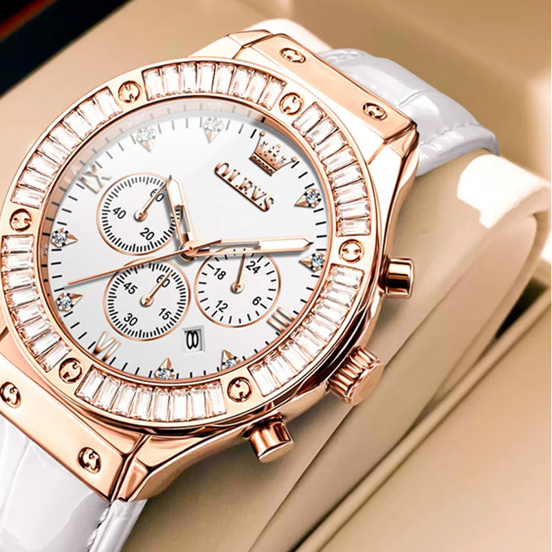 Elegant women's OLEVS wristwatch with leather strap, diamond bezel, waterproof design, and chronograph features.