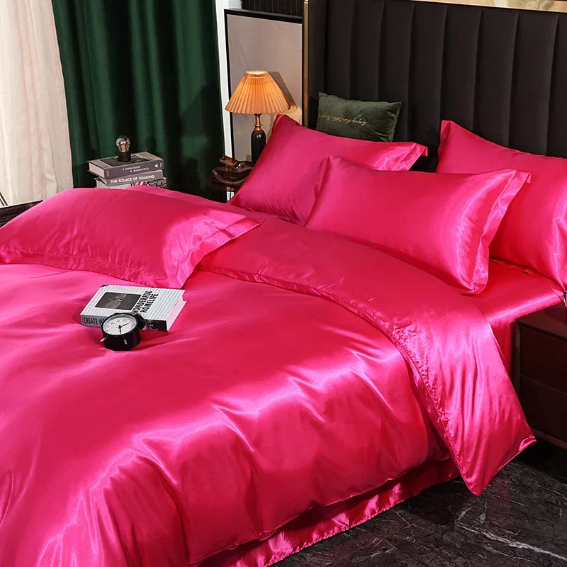 Luxury silk bedding set with duvet cover, fitted sheet, flat sheet, and pillowcases in solid color, King and Queen sizes.