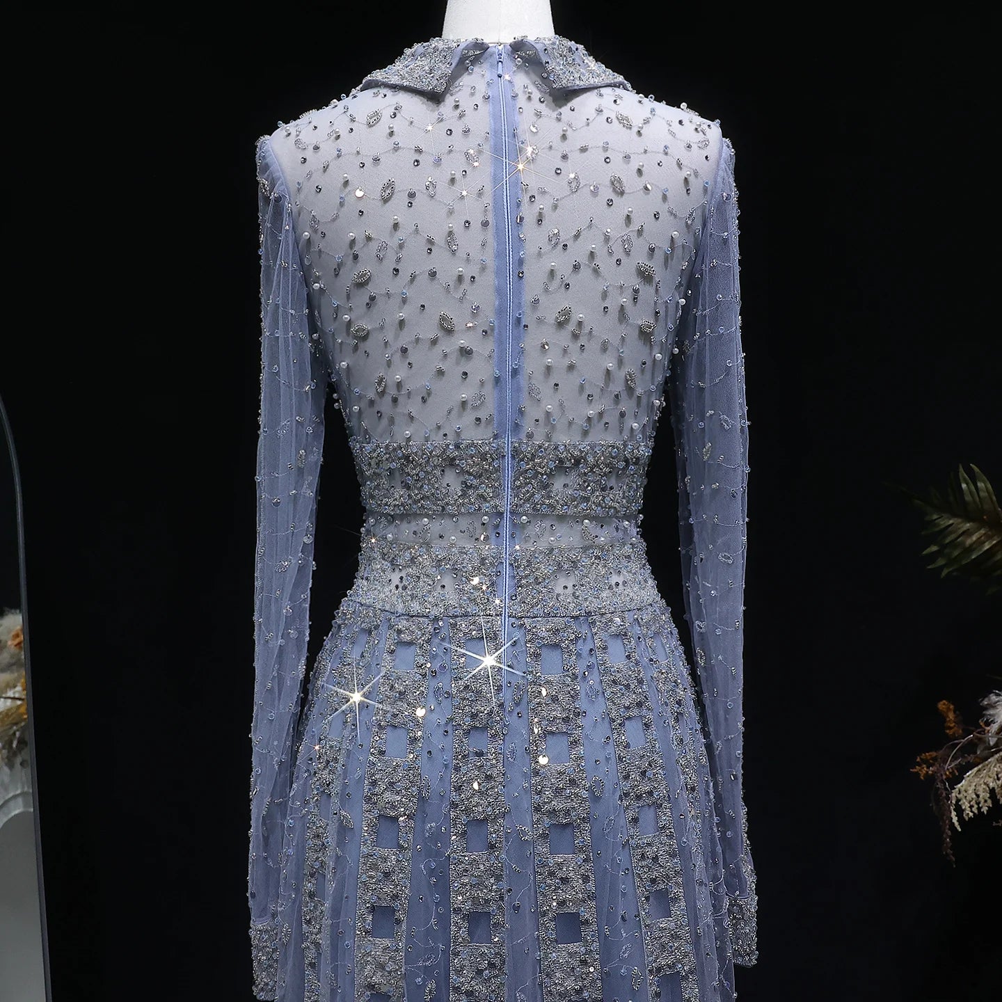 Elegant MC THE BLACK DIAMOND MC long sleeve evening dress with V-neck, beaded embellishments, A-line silhouette, perfect for prom or formal events.