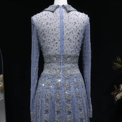Elegant MC THE BLACK DIAMOND MC long sleeve evening dress with V-neck, beaded embellishments, A-line silhouette, perfect for prom or formal events.