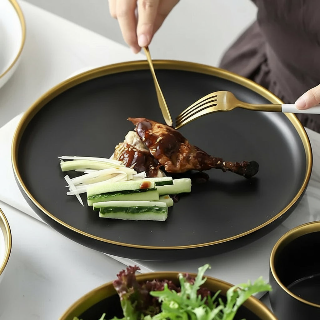 Black and white matte porcelain dinner plate from MC THE BLACK DIAMOND, ideal for modern kitchen table settings.