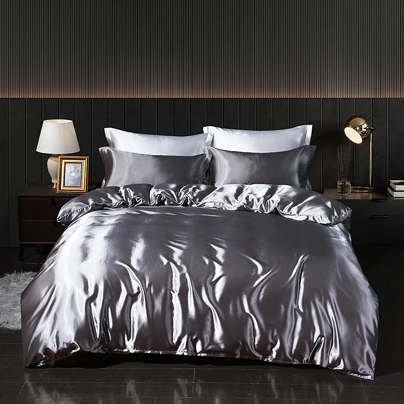 Luxury satin bedding set with fitted sheet and duvet cover by MC THE BLACK DIAMOND, showcasing smooth, elegant home decor.