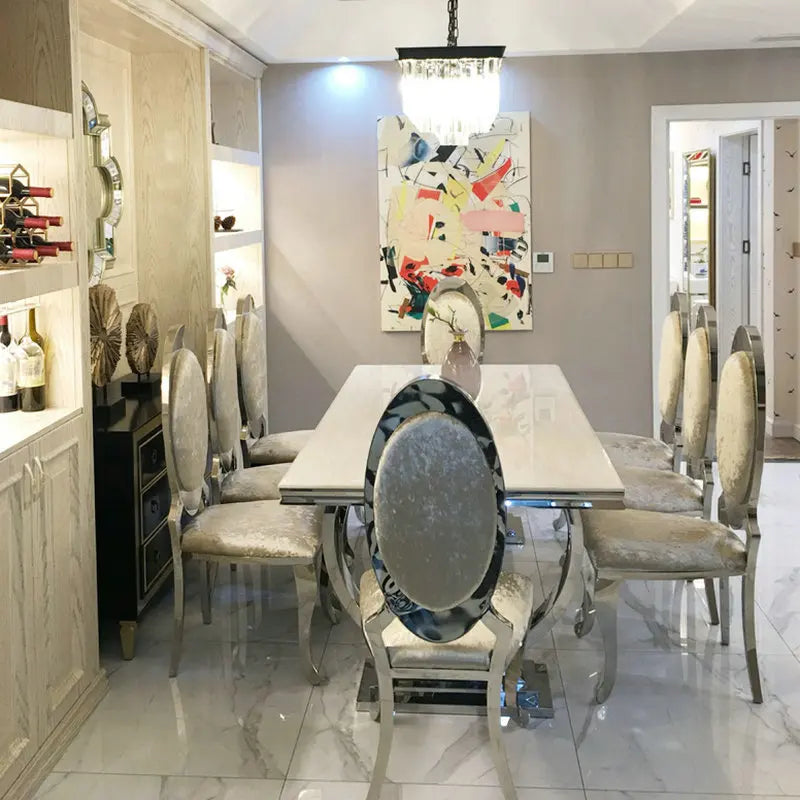 Royal Nordic Light luxury dining table with marble top, silver stainless steel legs, seats 4 to 8, modern home decor by 𝕄𝕔 𝕋𝕙𝕖 𝔹𝕝𝕒𝕔𝕜