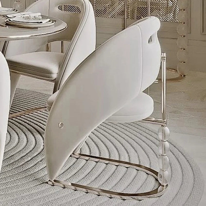 Nordic modern soft dining armchair by 𝕄𝕔 𝕋𝕙𝕖 𝔹𝕝𝕒𝕔𝕜 𝔻𝕚𝕒𝕞𝕠𝕟