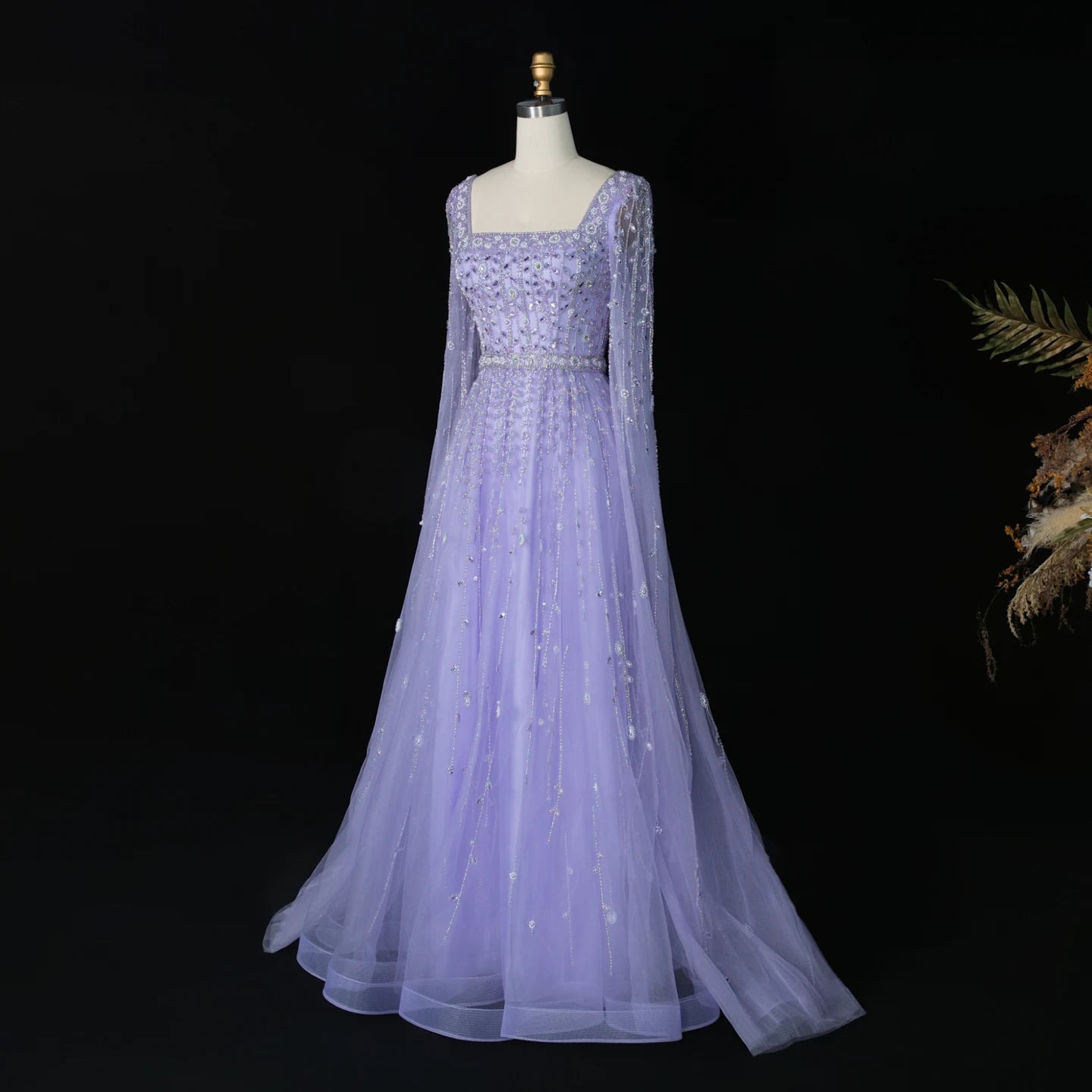 Elegant MC THE BLACK DIAMOND MC Luxury Pink Dubai evening dress with intricate details and flowing fabric.