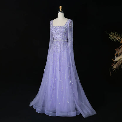 Elegant MC THE BLACK DIAMOND MC Luxury Pink Dubai evening dress with intricate details and flowing fabric.