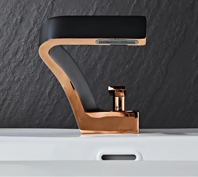 Brass black and gold basin bathroom sink faucet by MC The Black Diamond with modern design and sleek finish.
