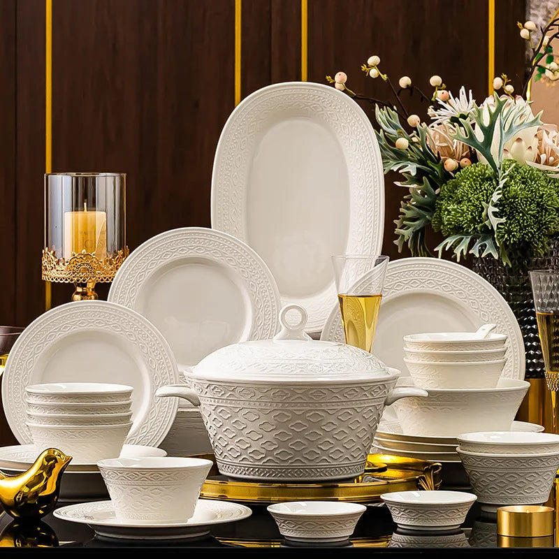 Luxury White Nordic ceramic dinnerware set with relief sculptures, including salad bowls, soup bowls, flat plates, and serving tray.