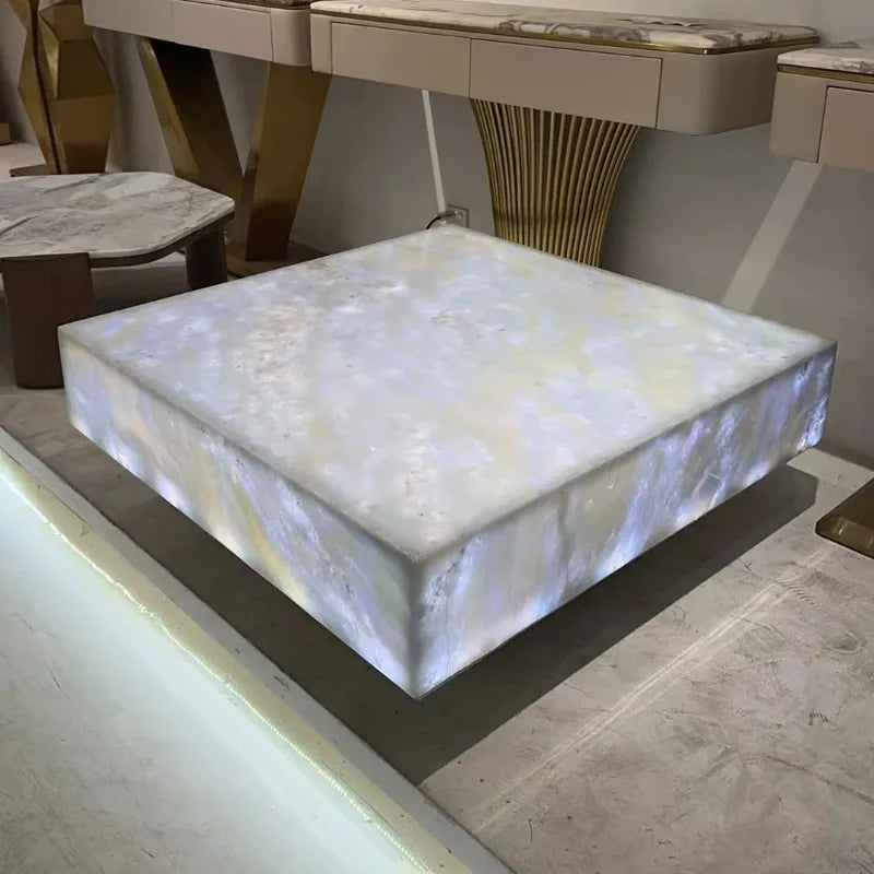 Square Ice Crack Onyx luminous coffee table by MC THE BLACK DIAMOND with backlit translucent surface, ideal for bars and restaurants.