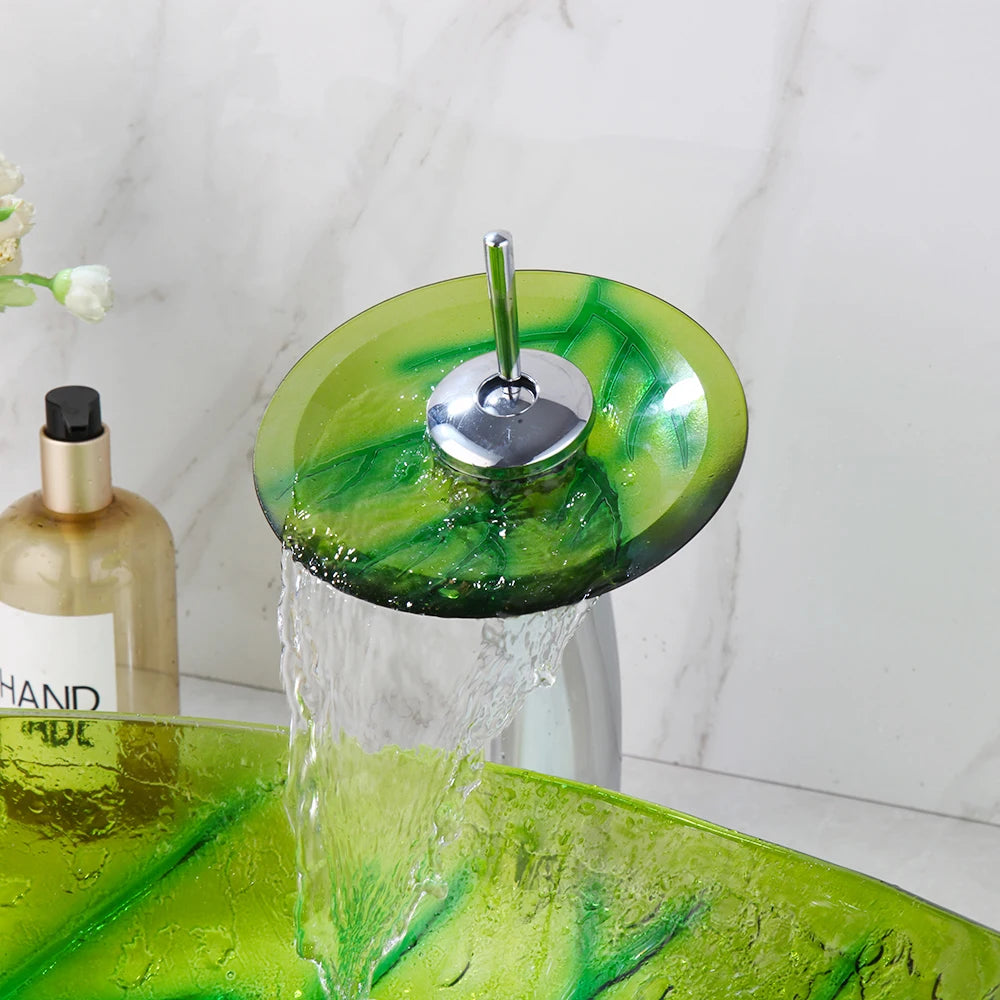 Green leaf-shaped bathroom wash basin sink by MC THE BLACK DIAMOND, vessel style with a smooth, organic leaf design for modern decor.