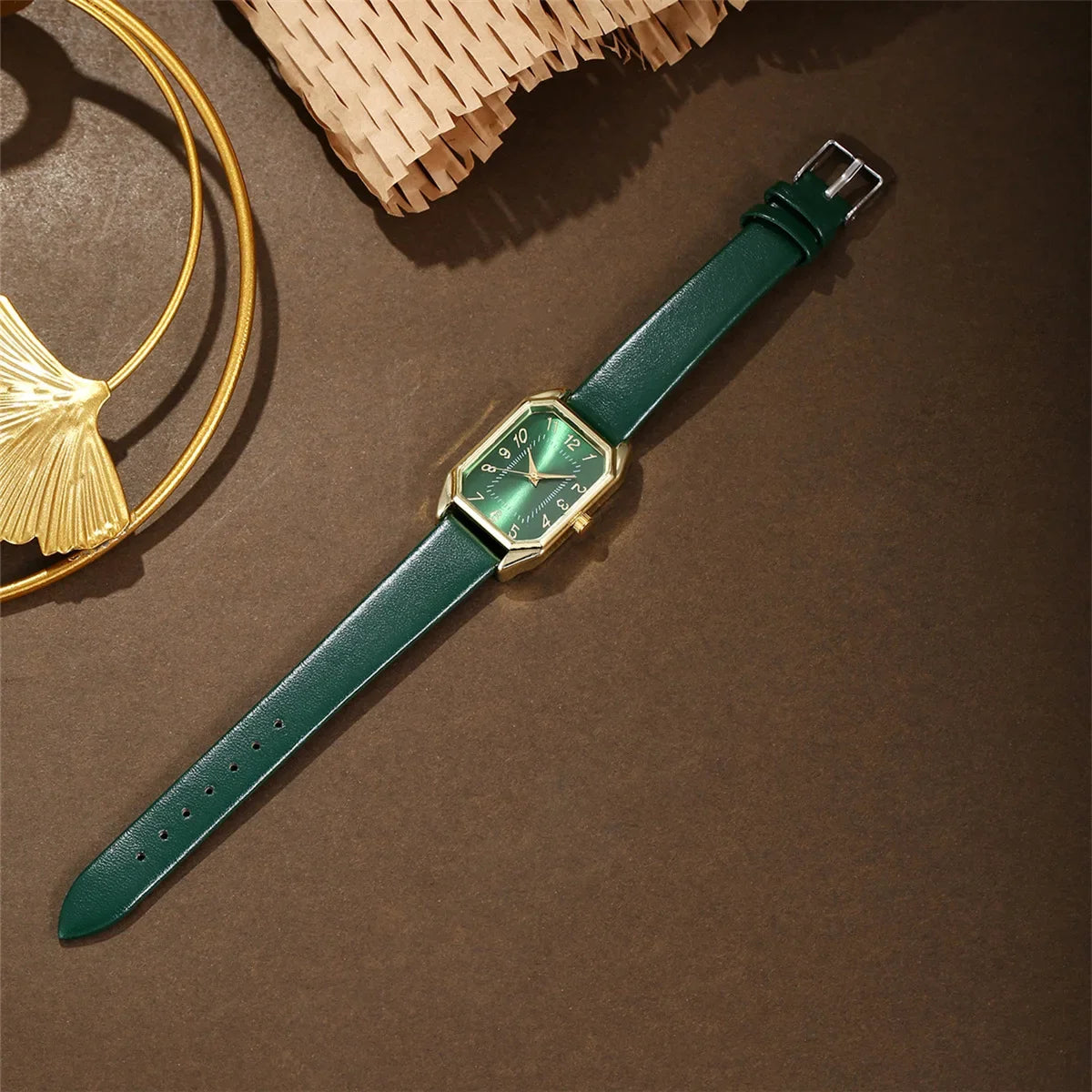Luxury fashion square women's watch from Mohammad Collection, featuring a sleek jewelry-style design and stylish gold-tone finish.