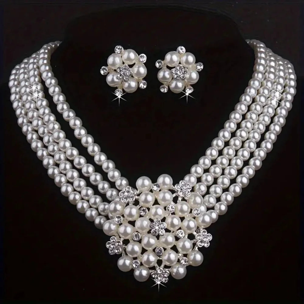 Vintage pearl wedding jewelry set by MC THE BLACK DIAMOND, includes necklace and earrings for weddings, parties, or festive occasions.