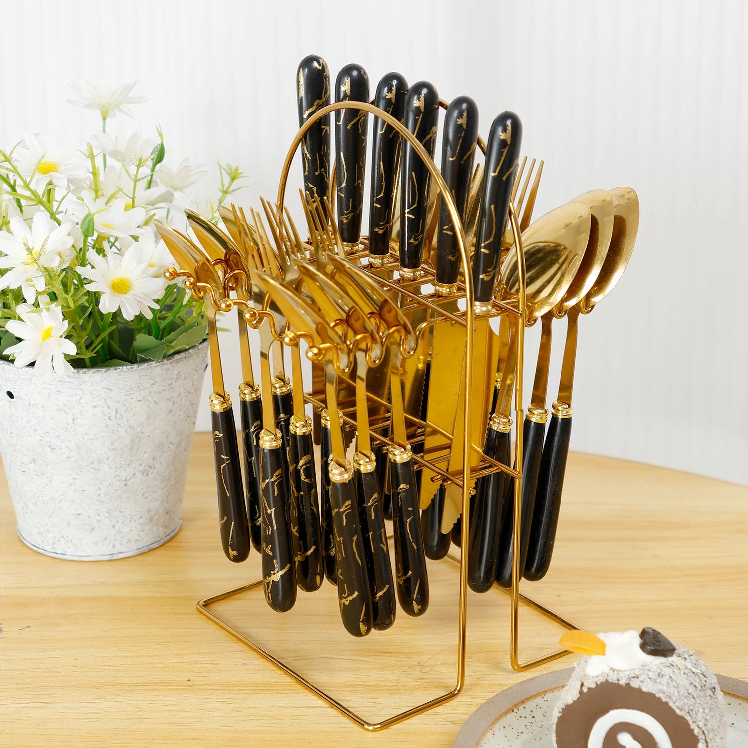 Stainless steel 24-piece cutlery set with holder, including forks, knives, and spoons, mirror polished for six diners.