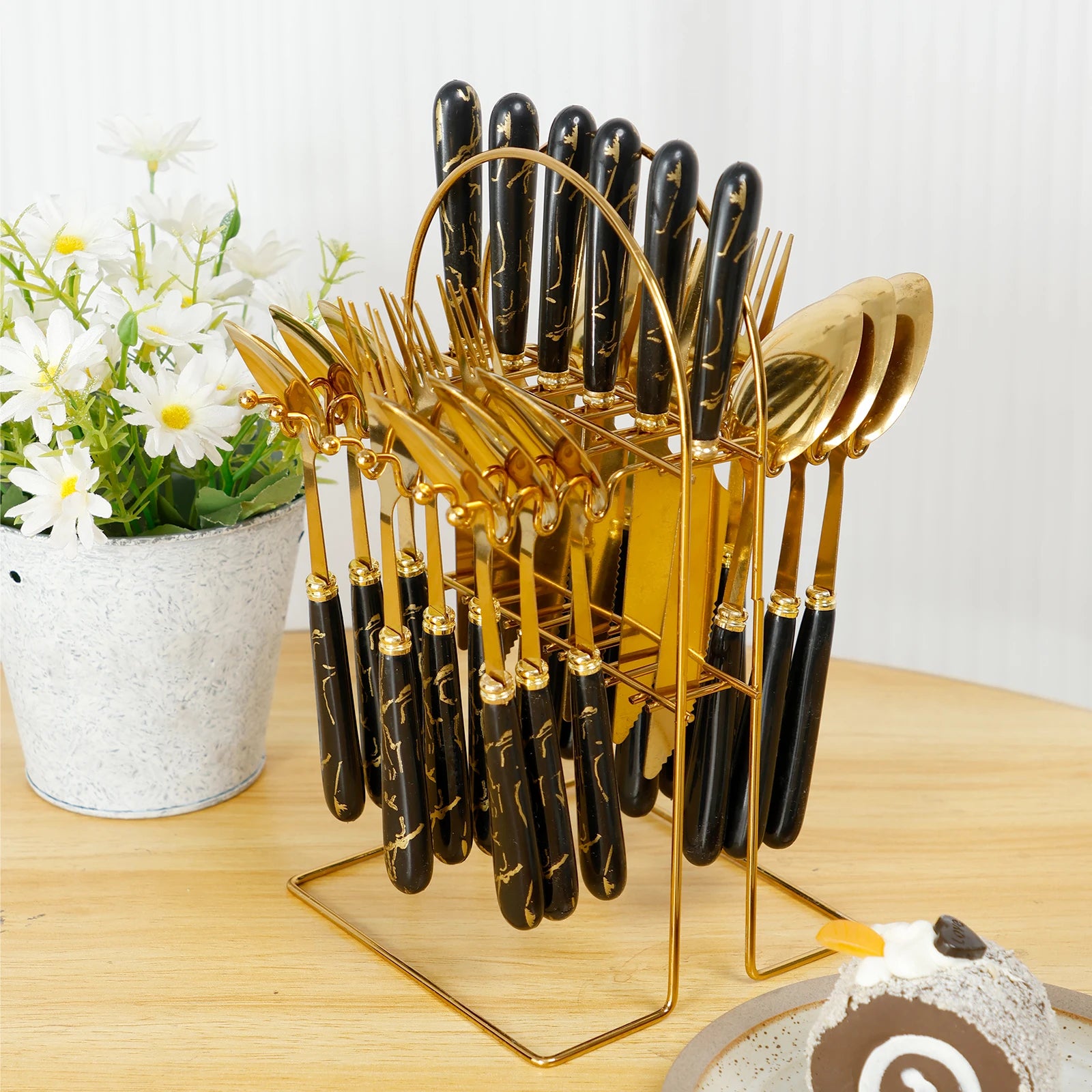 Stainless steel 24-piece cutlery set with holder, including forks, knives, and spoons, mirror polished for six diners.