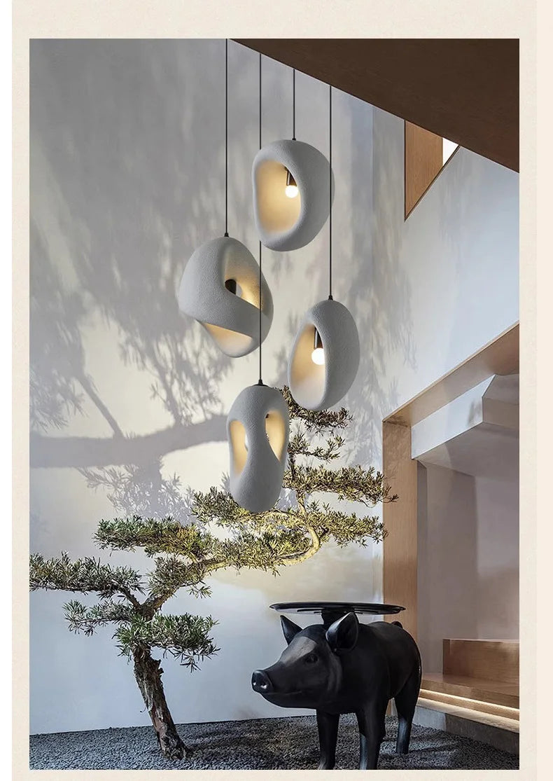 Nordic Villa Stairs Wabi Sabi E27 LED pendant lights by MC THE BLACK DIAMOND hanging along a staircase with warm ambient lighting
