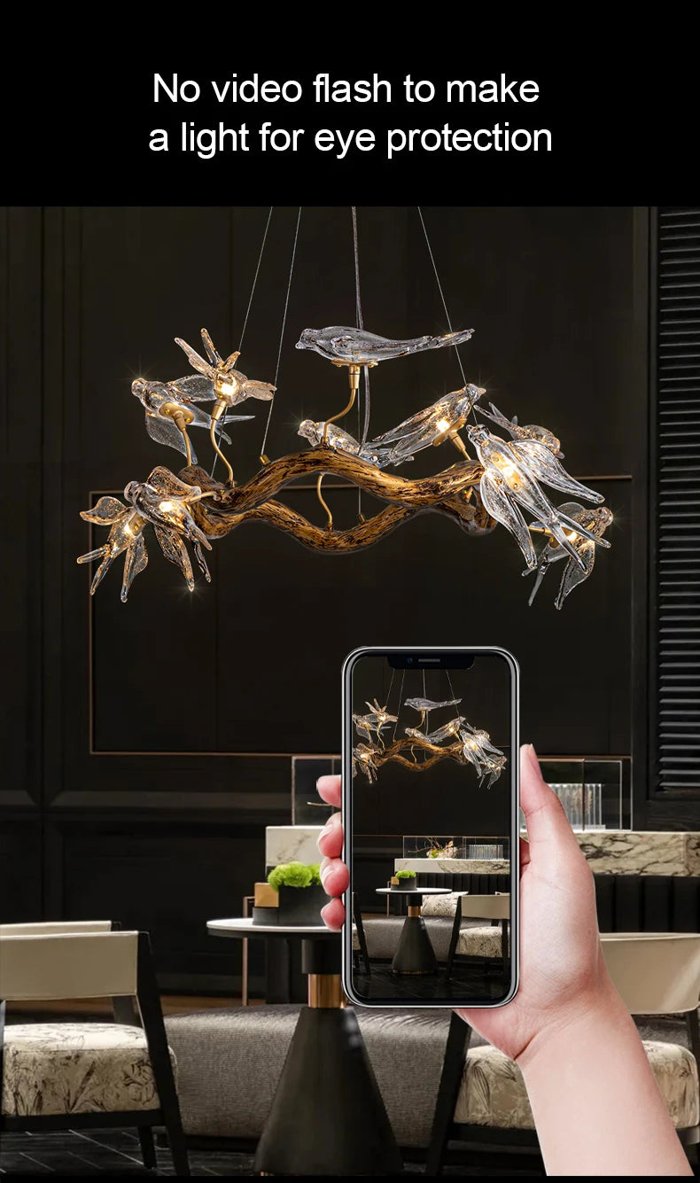 Vintage round bird chandelier featuring swallow design by MC THE BLACK DIAMOND, hanging ceiling light fixture with intricate metal details.