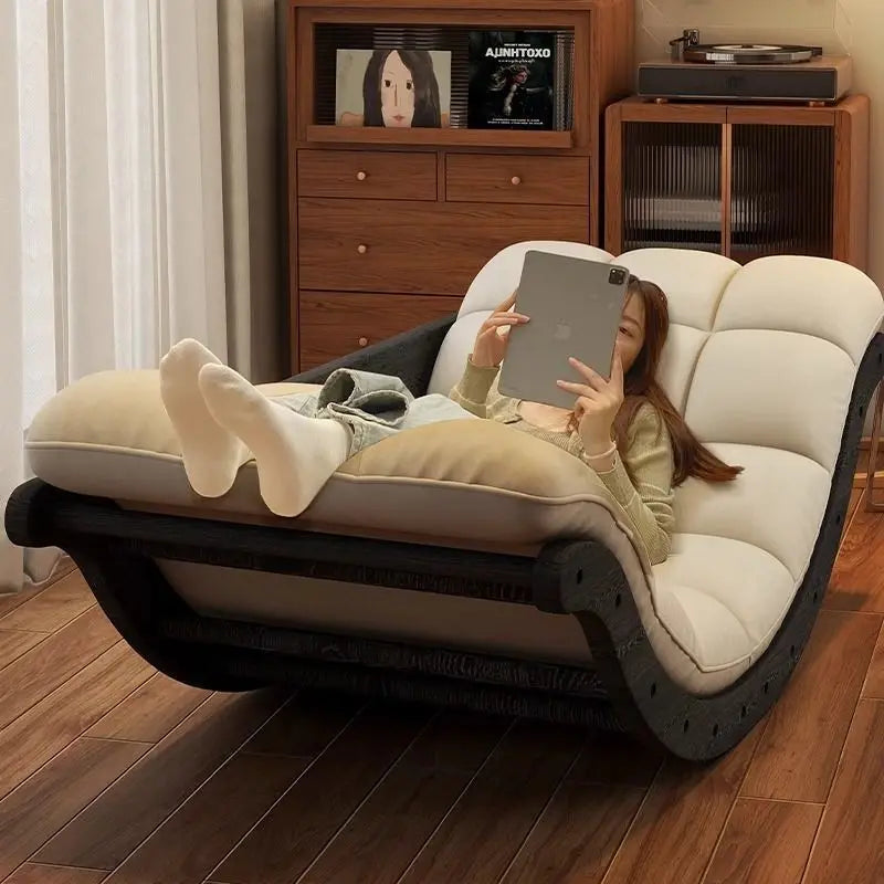 Classic Mc The Black Diamond rocking chair with solid wood frame, shown as a retro-style home recliner in a cozy living room setting.