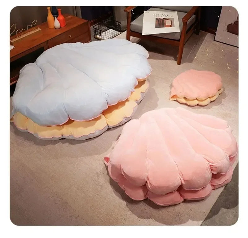 Large clam shell cushion plush pillow from MC The Black Diamond, designed as a seashell-shaped sofa cushion for kid beds.