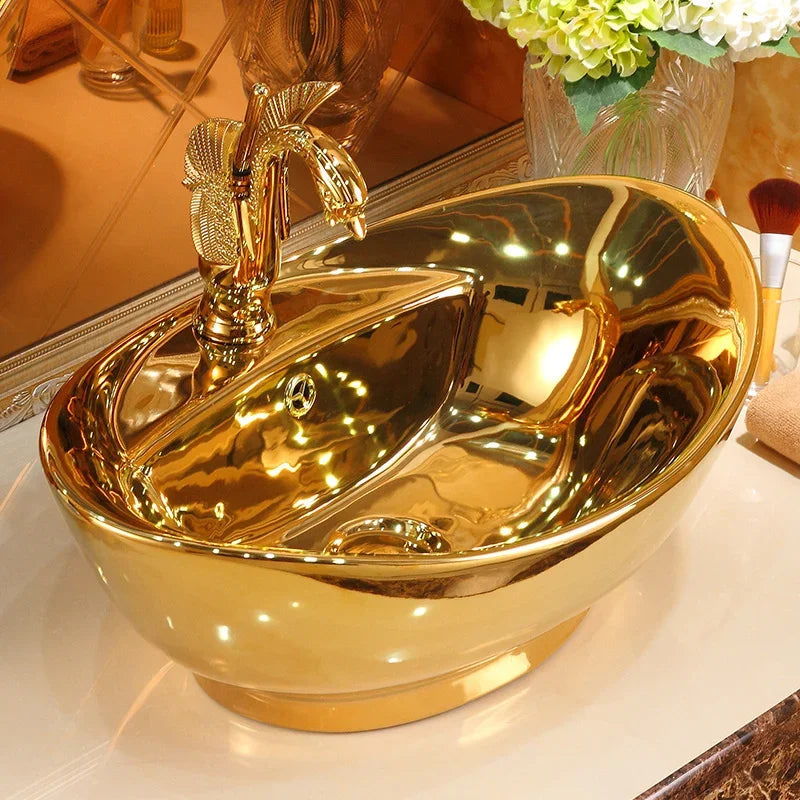 Modern ceramic gold bathroom sink by MC THE BLACK DIAMOND, European-style hand basin with sleek wash basin design for home decor.