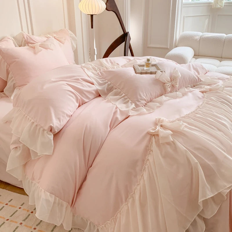 Three-piece white bedding set with ruffled duvet cover from MC The Black Diamonds, featuring soft bedsheets and decorative ruffles.