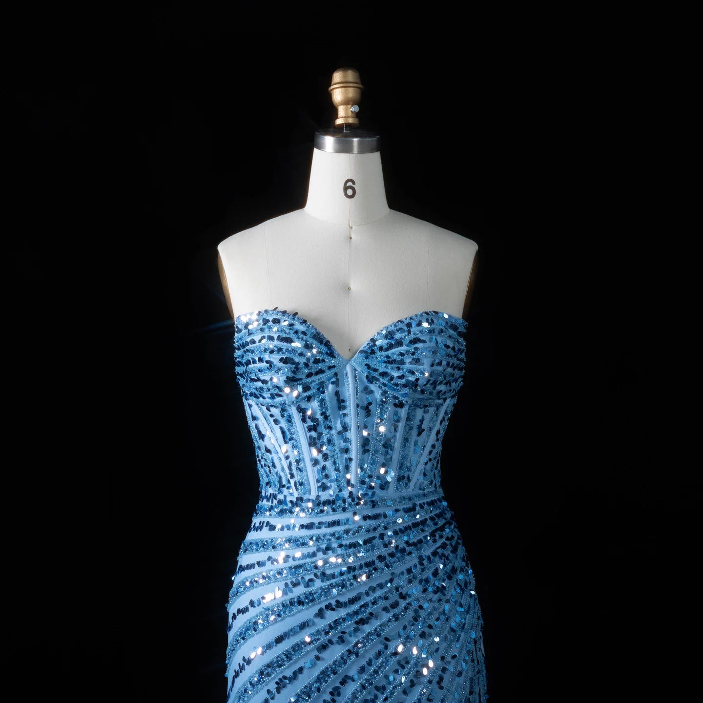 Elegant MC THE BLACK DIAMOND women's wedding and prom dress with intricate detailing and a flowing silhouette.