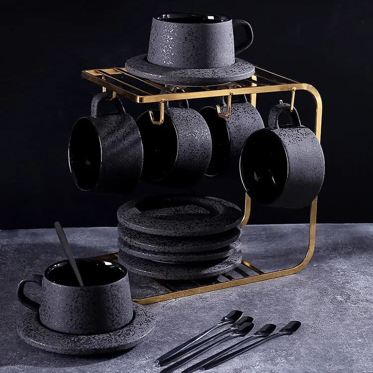 High-grade frosted ceramic coffee cup and saucer set with black spoon and cup holder, designed for breakfast or kitchen use.