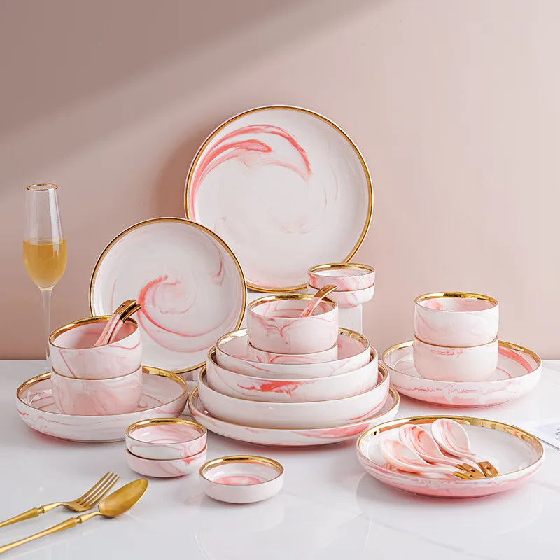 Pink porcelain dinner plate with gold accents and marble pattern, part of MC THE BLACK DIAMOND's ceramic kitchenware set.