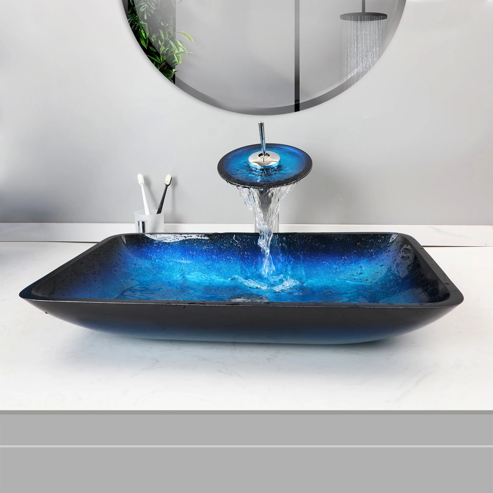 MC THE BLACK DIAMOND ZAPPO tempered glass bathroom vessel sink with blue basin and black waterfall faucet tap, above counter oval design