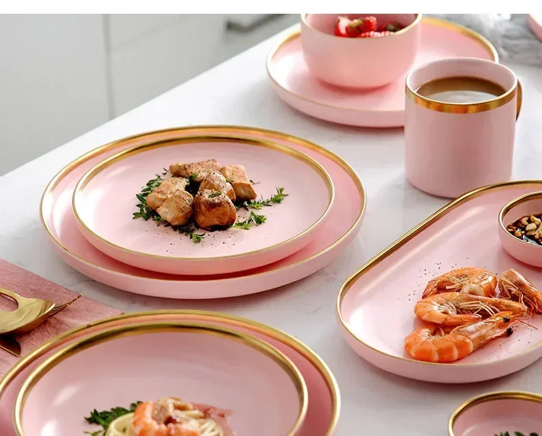 Gilt rim pink porcelain dinner plate from MC The Black Diamonds with a ceramic finish, perfect for rice, salad, or noodles.