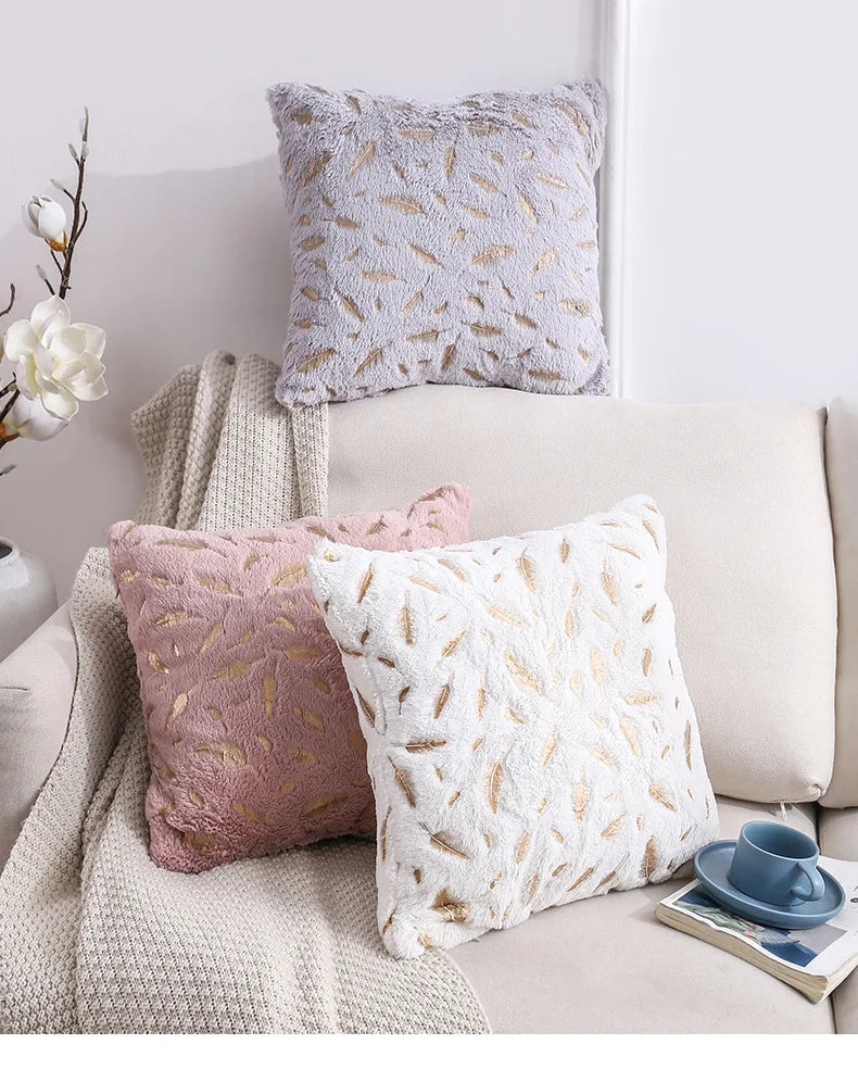 Gold feather velvet pillow cover featuring decorative feather design, 45x45 cm, perfect for sofa or car decor.