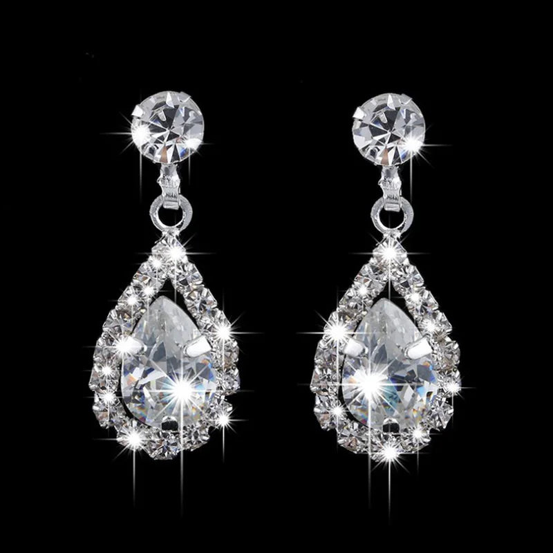 Vintage crystal waterdrop pendant necklace and earrings set in silver, part of MC THE BLACK DIAMOND wedding jewelry collection.