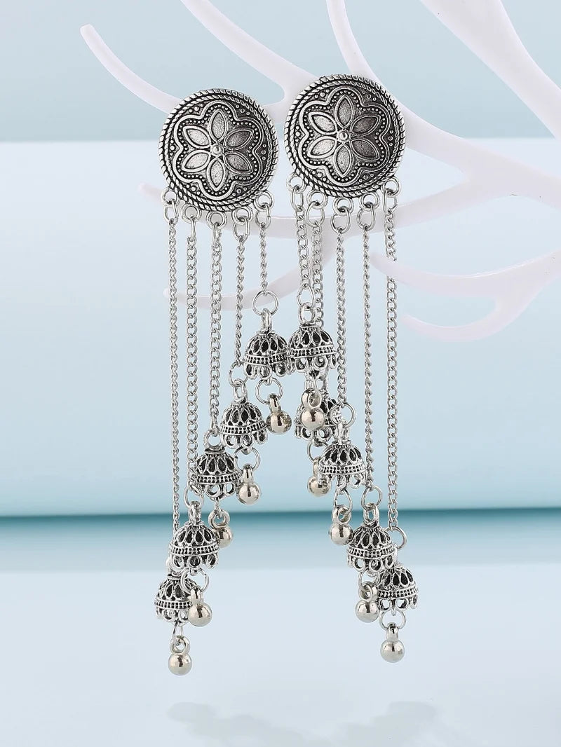 Vintage ethnic bell earrings featuring tassels, floral design, and Indian-inspired details by 𝕄𝕔 𝕋𝕙𝕖 𝔹𝕝𝕒𝕔𝕜 𝔻𝕚𝕒�