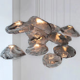 Modern MC THE BLACK DIAMOND crystal chandelier hanging with multiple sparkling crystal tiers for elegant home lighting.