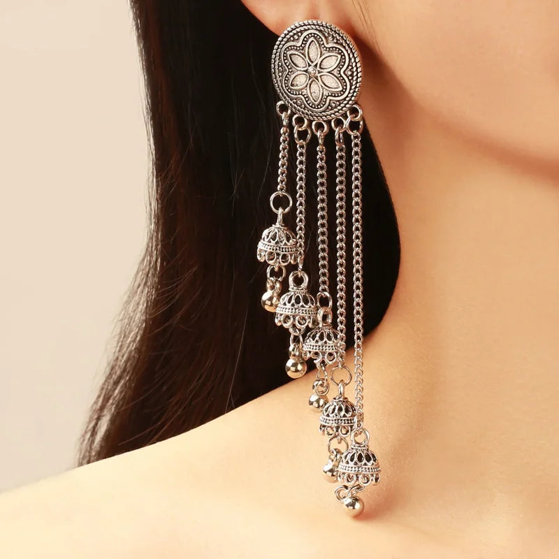 Vintage bohemian bell earrings with tassels, floral design, and Indian-inspired details from 𝕄𝕔 𝕋𝕙𝕖 𝔹𝕝𝕒𝕔𝕜 𝔻𝕚𝕒