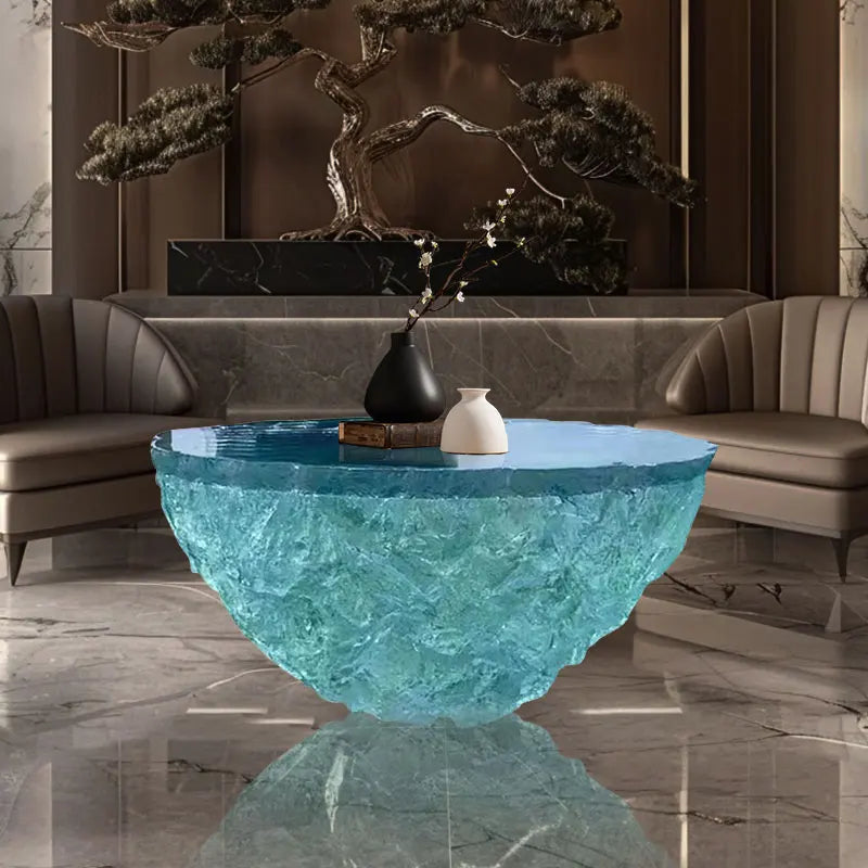 Clear resin coffee table by MC THE BLACK DIAMOND, showcasing a modern transparent design with a smooth surface and sturdy base.